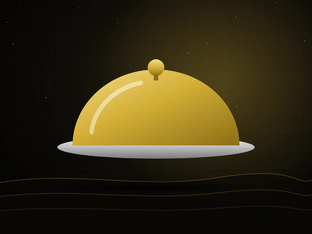 Covered meal served under a gold cloche